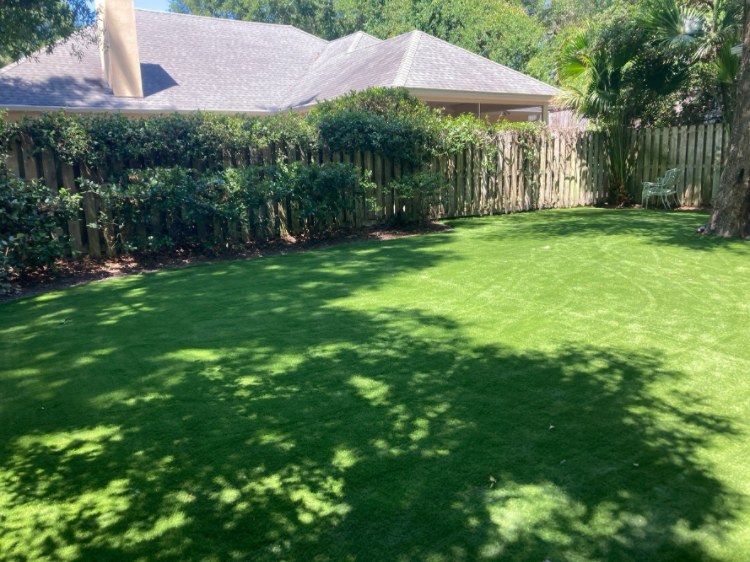 Finished artificial turf lawn installed by Green Gorilla Turf at a Tampa Bay home